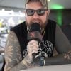 Chris Fronzak, lead vocalist of Attila, speaking during an interview or public event