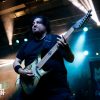 A photo of Dino Cazares playing with Fear Factory.