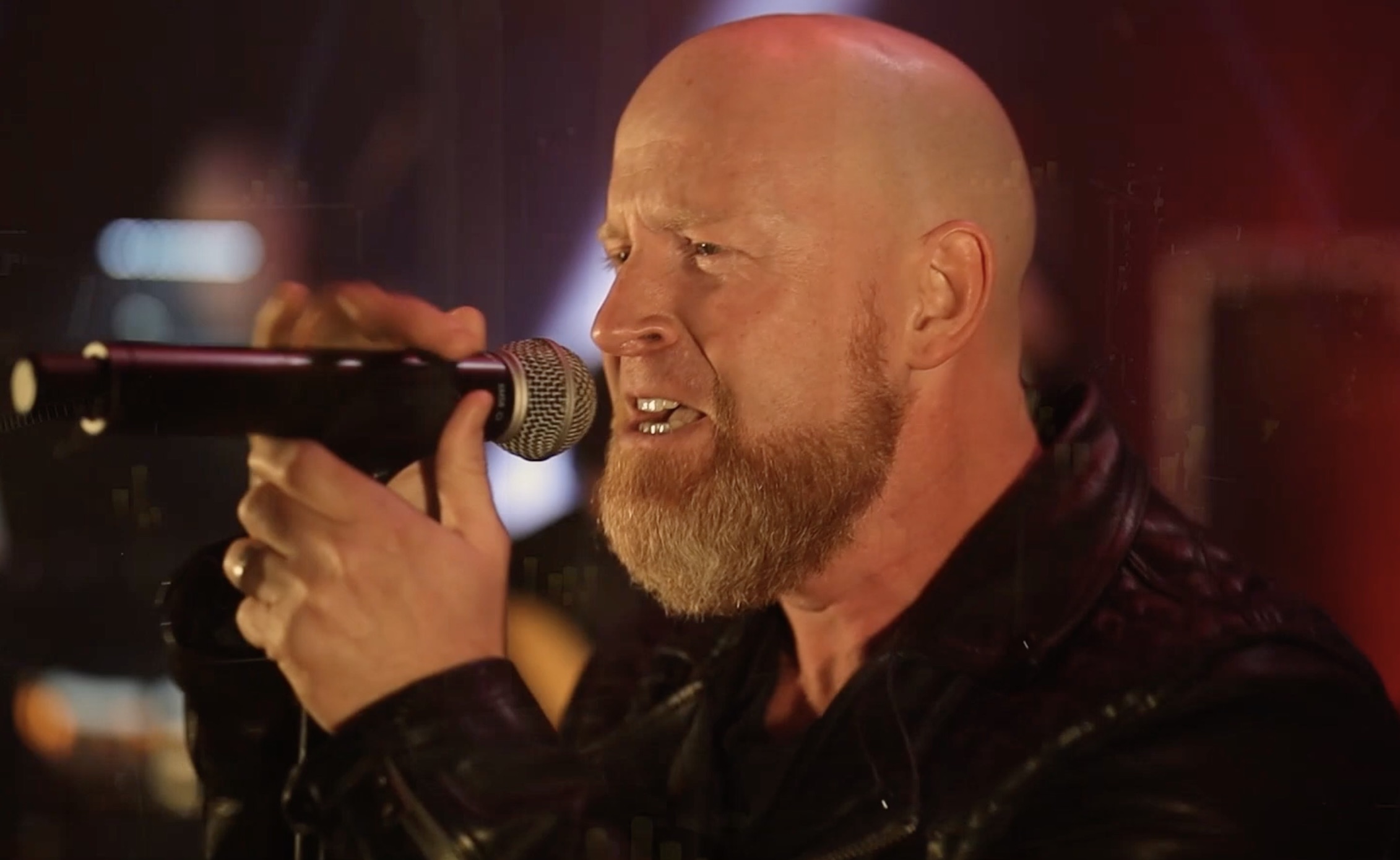 Michael Barnes, longtime vocalist of RED, pictured before his final performance with the band.