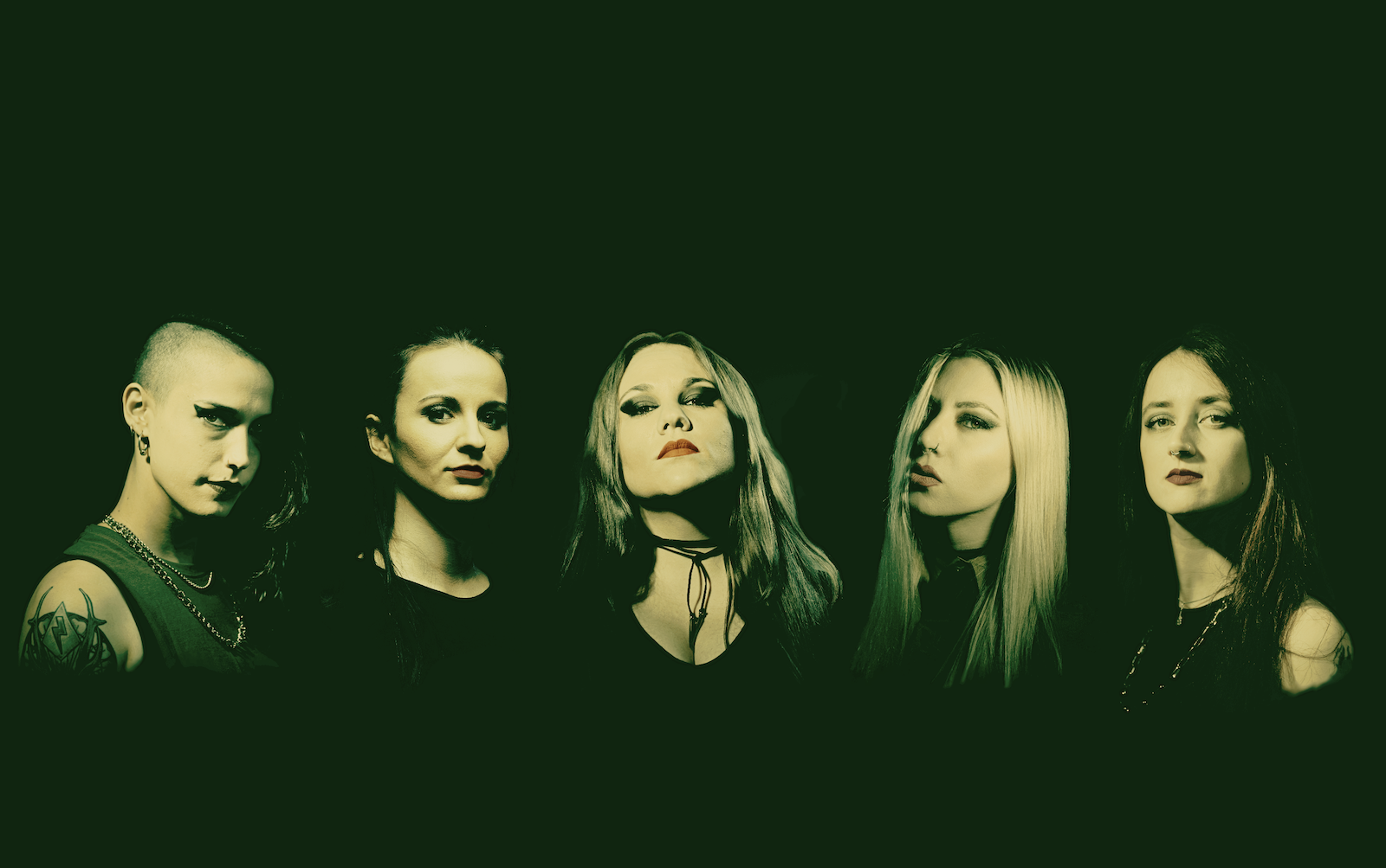 Promotional posed photo of the all-female thrash metal band Nervosa, featuring Prika Amaral (vocals, guitars), Helena Kotina (guitars), Hel Pyre (bass), Emmelie Herwegh (bass), and Michaela Naydenova (drums).